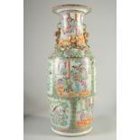 A LARGE CHINESE CANTON FAMILLE ROSE PORCELAIN VASE, the neck with moulded chilong, painted with