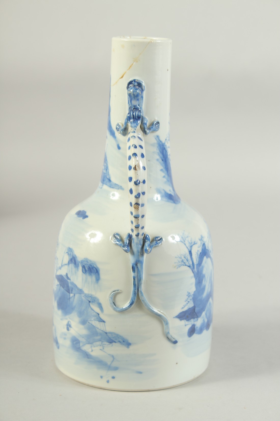 A JAPANESE ARITA BLUE AND WHITE PORCELAIN JUG, painted with landscape and with dragon formed handle, - Image 4 of 8