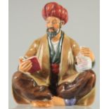 A ROYAL DOULTON PORCELAIN FIGURE; OMAR KHAYYAM (STYLE TWO), designer M. Nicoll, issued 1965-1983, (