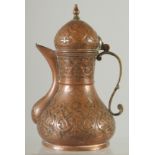 A 19TH CENTURY OTTOMAN TURKISH COPPER COFFEE POT, 18cm high.