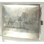 A FINE IRAQI NIELLO SILVER CIGARETTE CASE, 10cm x 8cm.