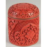 A CHINESE CINNABAR LACQUER CYLINDRICAL BOX AND COVER, 9.5cm high.