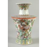 A LARGE CHINESE TRI-COLOUR PORCELAIN VASE, painted with exotic birds and flowers, red character mark