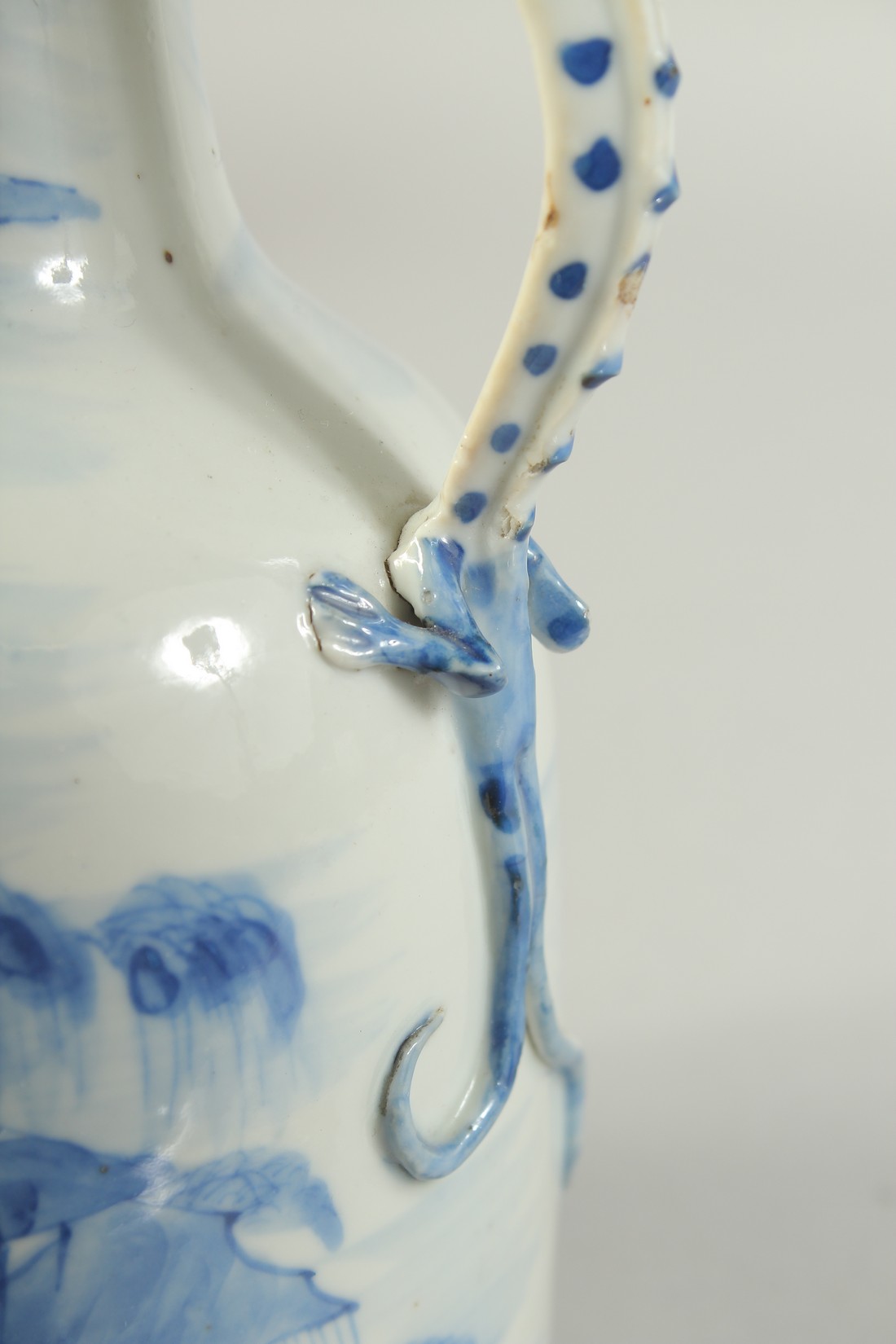 A JAPANESE ARITA BLUE AND WHITE PORCELAIN JUG, painted with landscape and with dragon formed handle, - Image 6 of 8