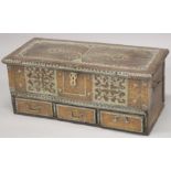 A MOORISH COFFER, with brass studded decoration, rising top, and candle box to the interior, the
