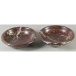 A PAIR OF LATE 19TH CENTURY/ EARLY 20TH CENTURY TURNED VARIEGATED ROUGE MARBLE BOWLS. 10ins