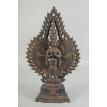 A BRONZE MULTI ARM DEITY. 16ins high.