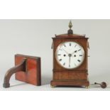 A GOOD REGENCY MAHOGANY BRASS INLAID BRACKET CLOCK by HOLMDEN, LONDON with enamel dial, strike/