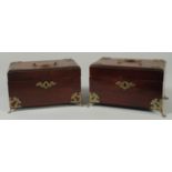 A GOOD PAIR OF GEORGE III MAHOGANY TEA CADDIES with velvet interiors and brass handles, on claw