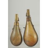 TWO BRASS MOUNTED HORN POWDER FLASKS. 6ins long.