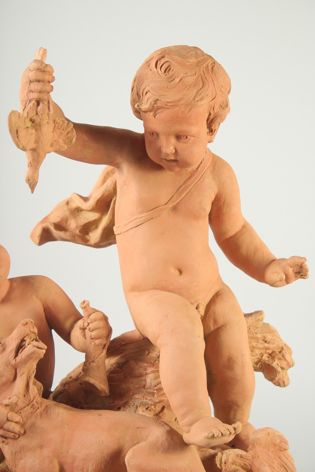 A GOOD LATE 19TH CENTURY TERRA COTTA GROUP, depicting two children tormenting a dog, holding a - Image 4 of 6