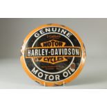 A CIRCULAR ENAMEL SIGN 'HARLEY DAVIDSON' 11.5ins diameter.