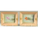 A PAIR OF HERMES PORCELAIN RECTANGULAR ASH TRAYS painted with flowers. 7.5ins x 6.5ins.