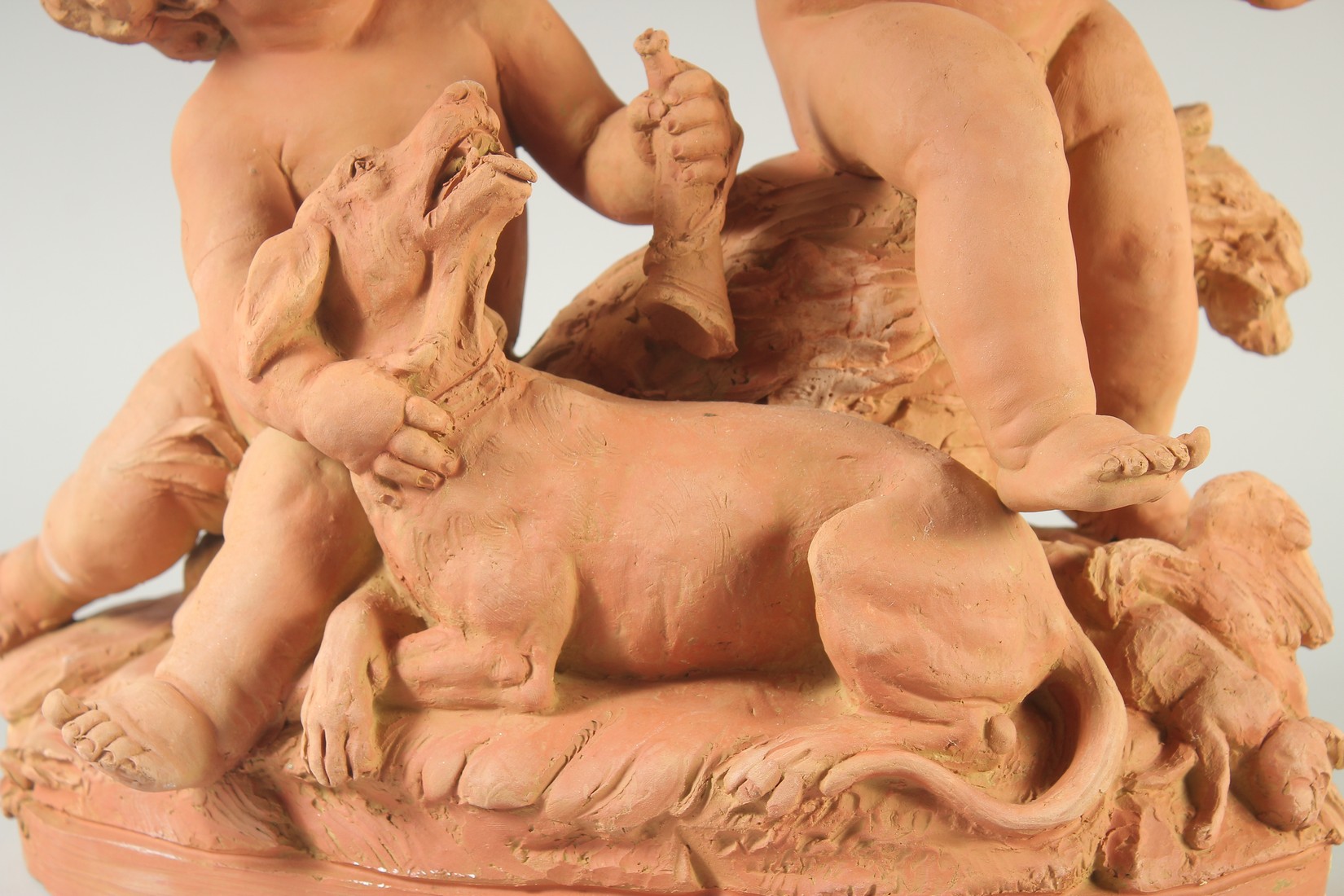 A GOOD LATE 19TH CENTURY TERRA COTTA GROUP, depicting two children tormenting a dog, holding a - Image 3 of 6