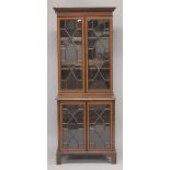 AN EDWARDIAN MAHOGANY INLAID STANDING CHINA CABINET with a pair of glazed astragal doors top and