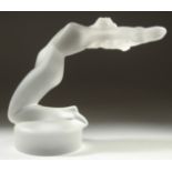 A LALIQUE GLASS NUDE on a circular base. Etched Lalique, France. 5ins high.