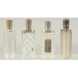 FOUR GOOD 19TH CENTURY FRENCH SILVER MOUNTED GLASS SCENT BOTTLES.