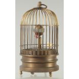 A BIRD CAGE CLOCK 6ins high.