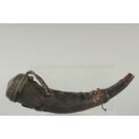 A VERY EARLY LEATHER CLAD POWDER HORN. 10ins long.