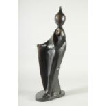 ANNE ROONEY (2OTH CENTURY) AMERICAN AN EGYPTIAN YOUNG LADY, urn on her head. Signed and dated