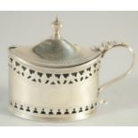 A GEORGE III SILVER OVAL MUSTARD POT AND COVER by HESTER BATEMAN with sapphire blue liner. London