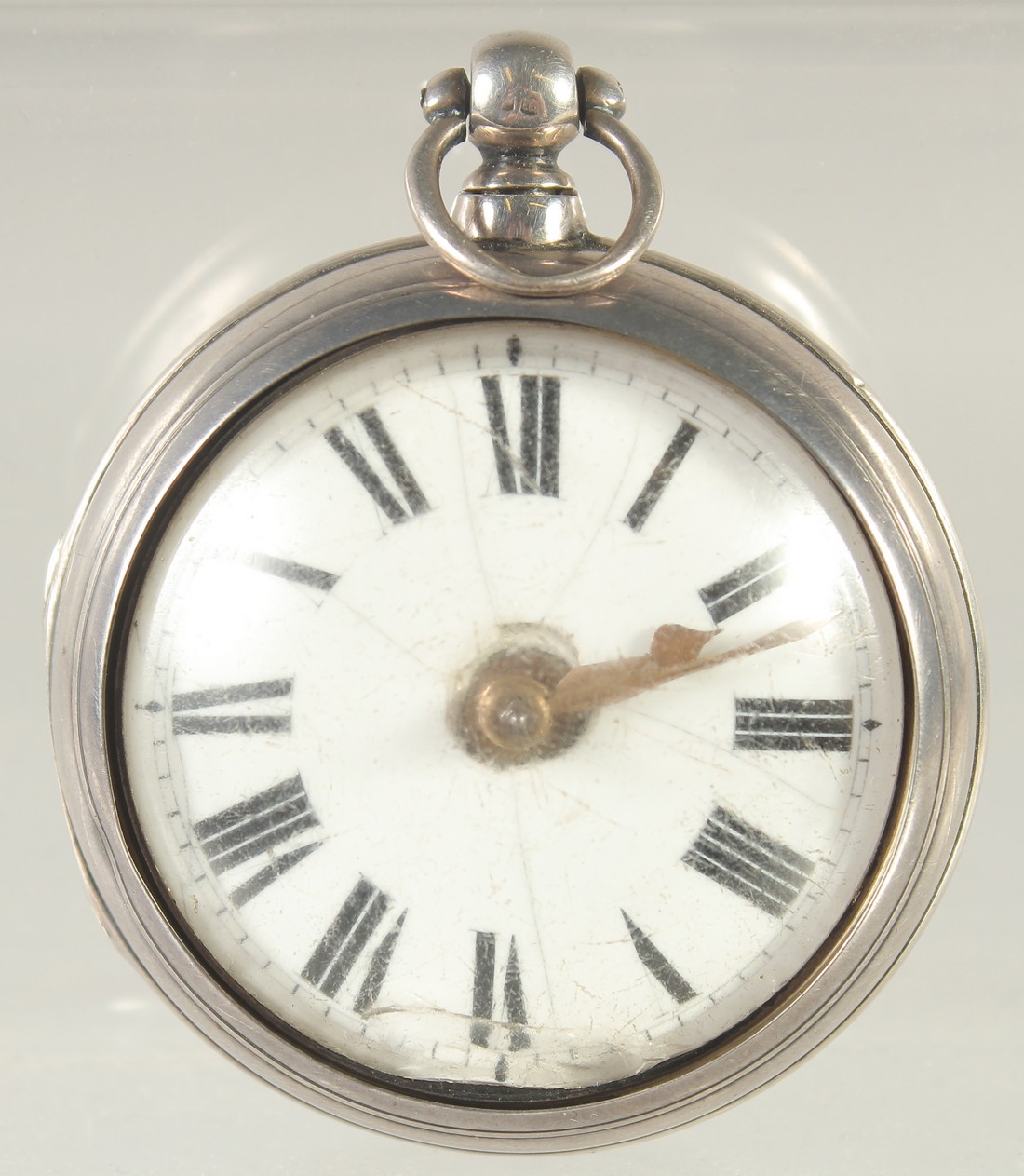 A GEORGE III SILVER VERGE POCKET WATCH by W. A. BAKER, Horsham. No. 702374, in an outer case.