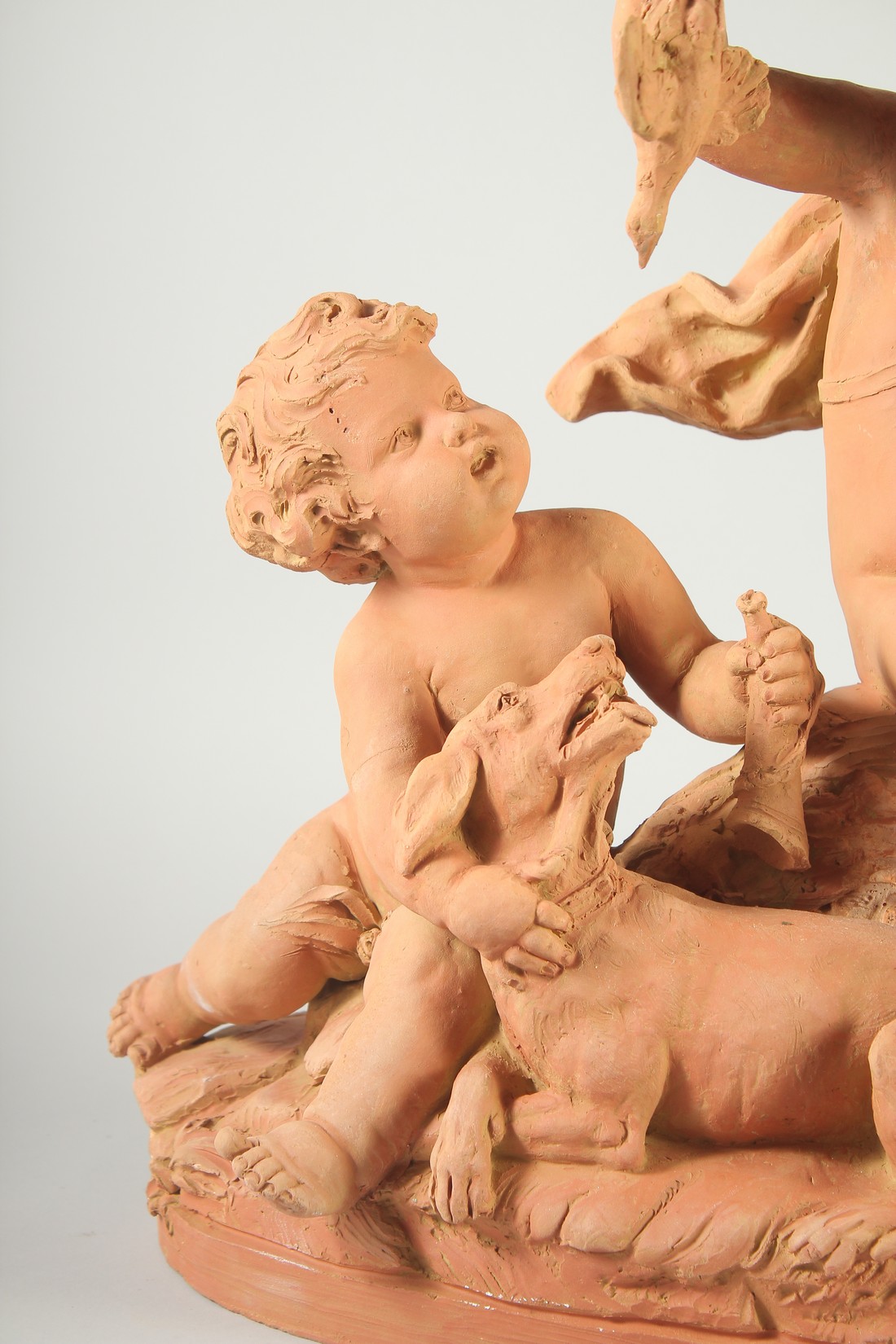 A GOOD LATE 19TH CENTURY TERRA COTTA GROUP, depicting two children tormenting a dog, holding a - Image 2 of 6