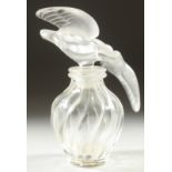A LALIQUE GLASS SCENT BOTTLE the stopper as two birds. 4ins high.