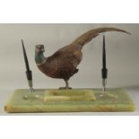 A SUPERB ONYX AND COLD CAST BRONZE INKSTAND with two pen holders and a cold cast bronze of a