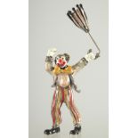 A STERLING SILVER AND ENAMEL DECORATED MODEL OF A CLOWN.