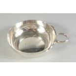 A STERLING SILVER WINE TASTER 54gms.