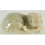 A CHINESE CARVED JADE FOO DOG. 2.5ins.