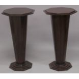 A PAIR OF ART DECO STYLE ROSEWOOD OCTANGONAL PEDESTAL STANDS. 2ft 6ins high x 1ft 4ins wide.