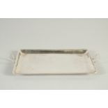 A GEORGE III SILVER TWO HANDLED TRAY. 9.5ins long. London 1782. Maker JAMES SUTTON & JOE BULT.