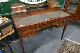 An Edwardian inlaid mahogany bonheur de jour or writing desk.