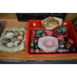 Collection of hardstone eggs and similar items.