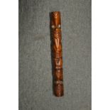 A New Zealand carved wood totem.