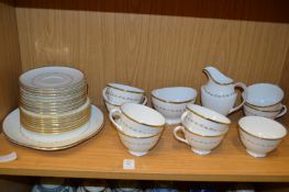 Royal Doulton Covington gilt decorated part tea service comprising nine cups, saucers and tea plates