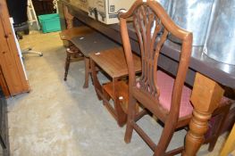 A dining chair and coffee tables.