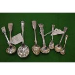 Seven various mustard spoons etc.