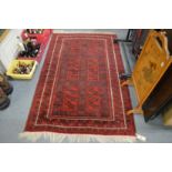 A modern Persian design rug 185cm x 115cm.