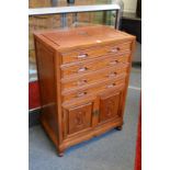 A Chinese hardwood floor standing cutlery canteen/cabinet.