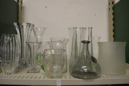 Glass jugs and vases.