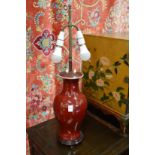 A pair of Chinese flambe baluster shaped vase lamps.