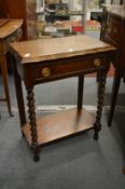 An oak side table.