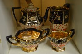 Lustre decorated part tea service.