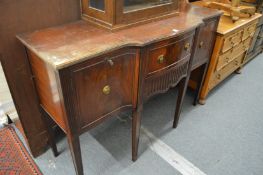 A mahogany sideboard.