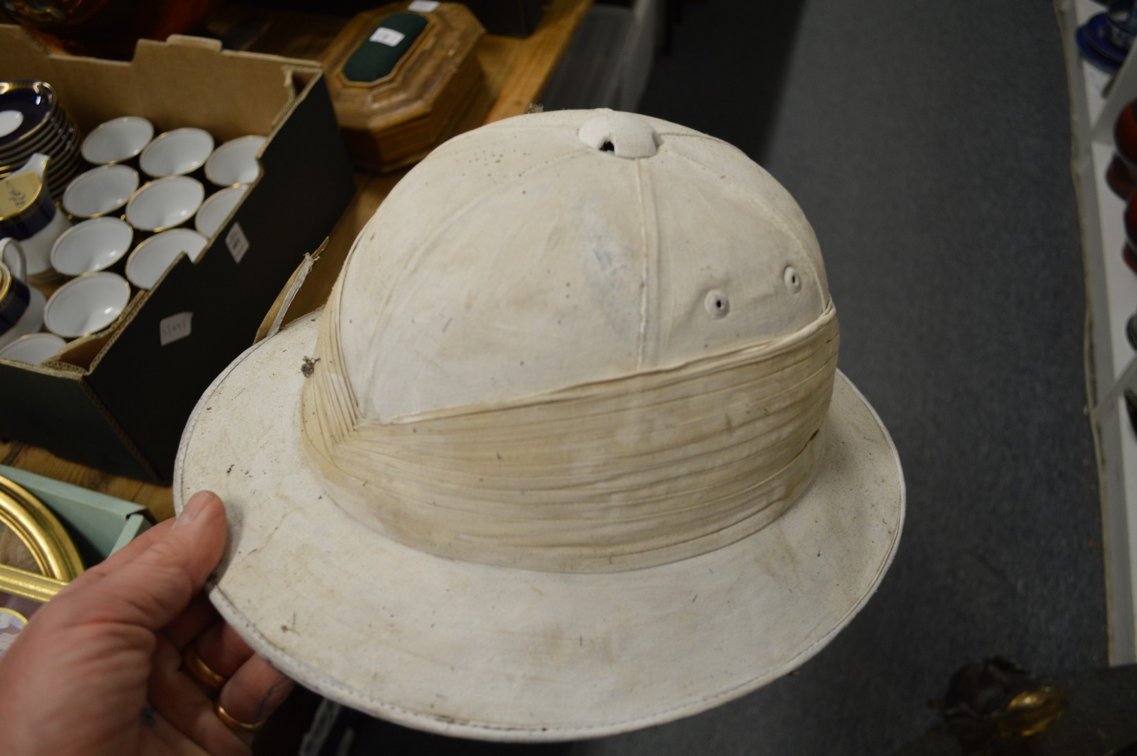 A Pith helmet in black Japanned tin hat box. - Image 2 of 4