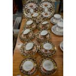 A good collection of Crown Derby, Imari cups, saucers and plates.