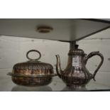 A plated melon shaped coffee pot and a muffin dish and cover.